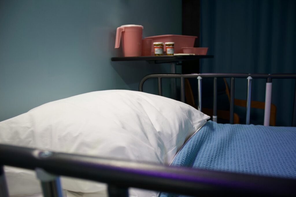 A photo of an empty hospital bed. 