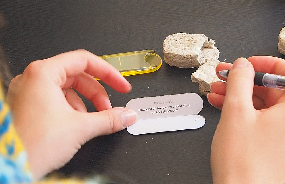 A photo of an open prompt with the text "This is painful. How could I have a balanced view on this situation?"